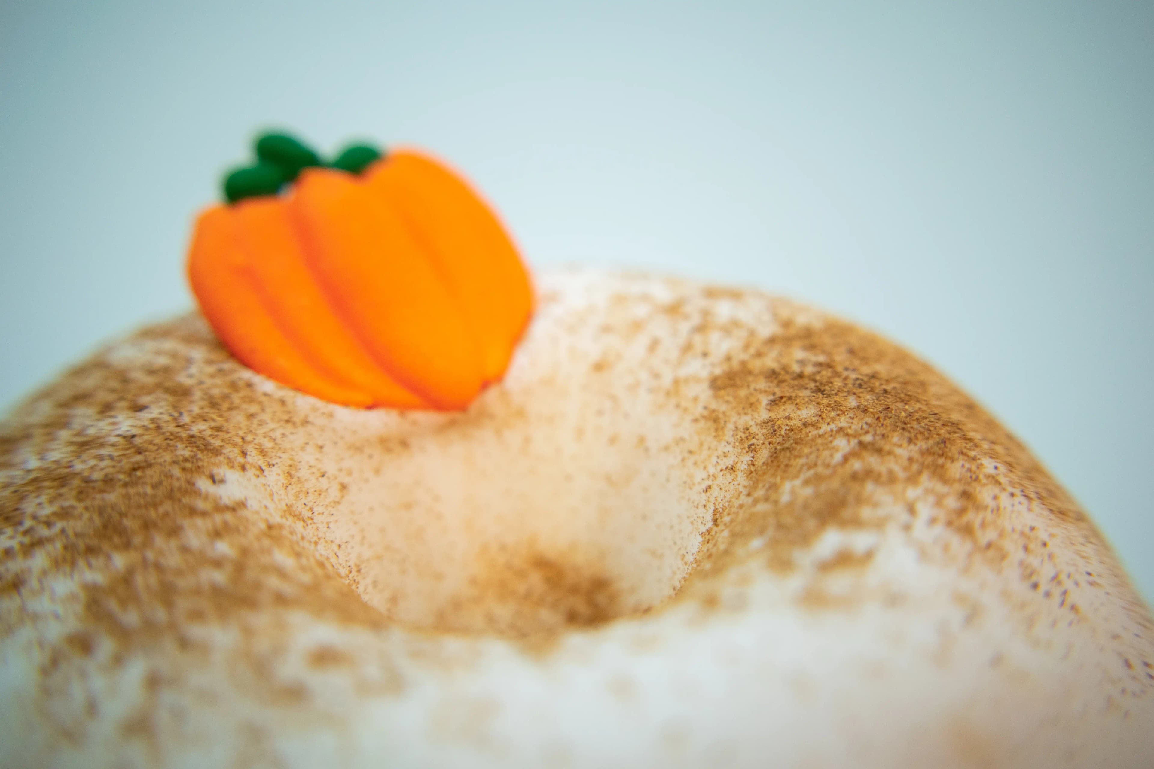 A close-up photo of Rotten Apples Canna Co.'s Pumpkin Spice Donut.