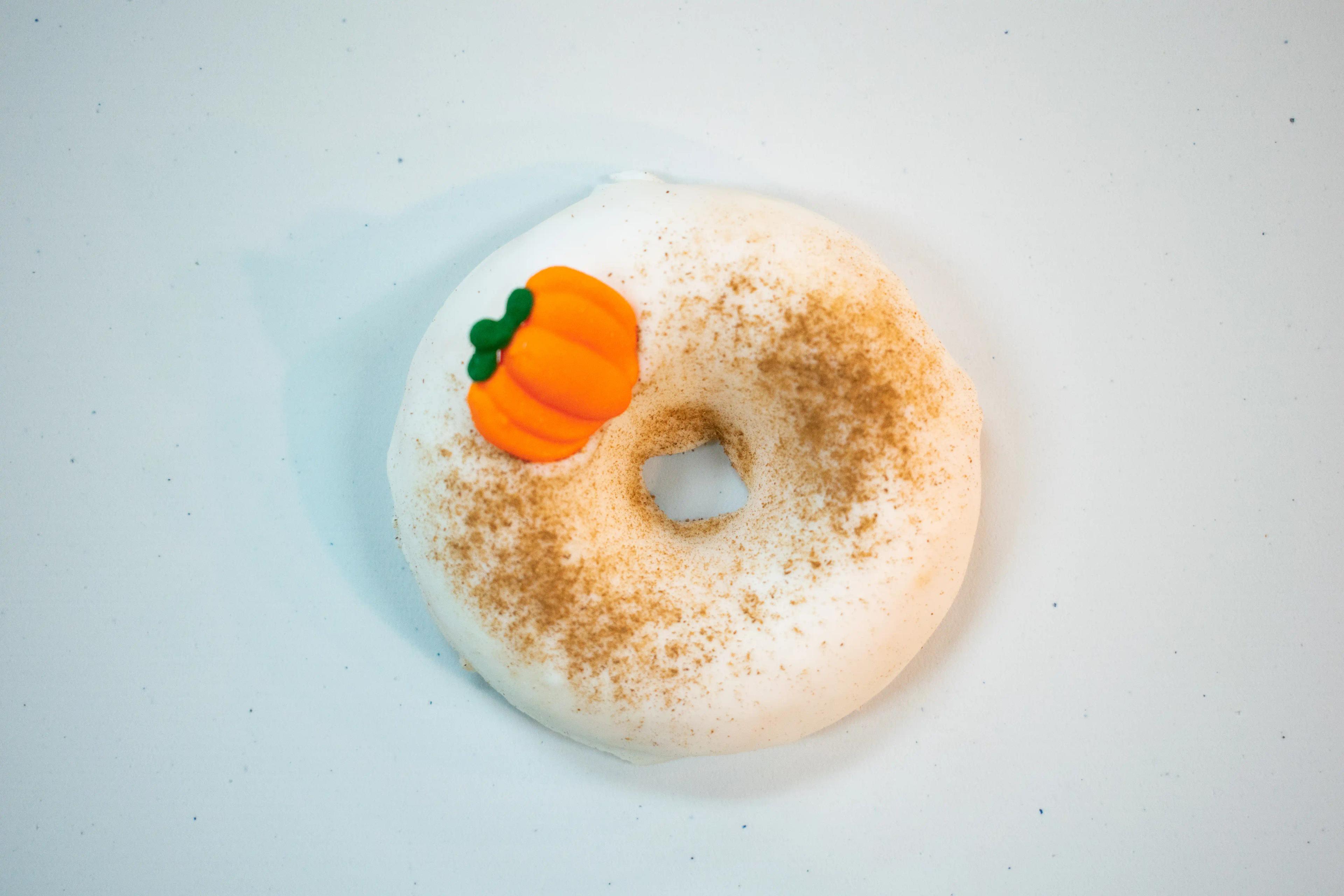 A top-down photo of Rotten Apples Canna Co.'s Pumpkin Spice Donut.